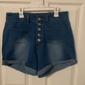 Shorts, size med but runs Large. (I’d say a full size to big). Button down front